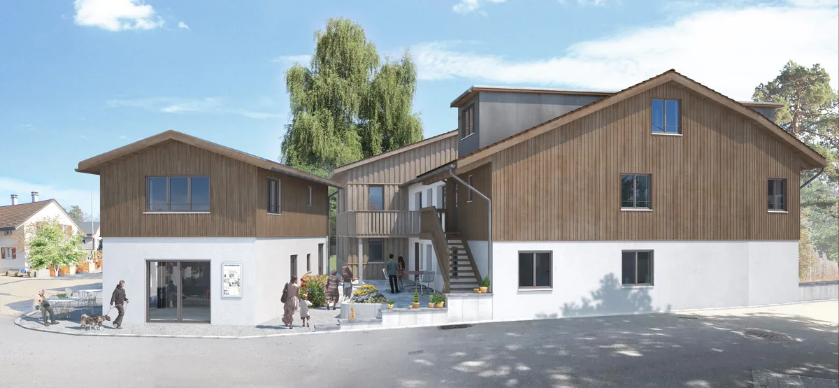 Der Bau soll im Sommer fertig sein und so aussehen. Links sieht man den Generationentreffpunkt und das Studio und rechts im Parterre die WG. Man sieht die Visualisierung von zwei Gebäuden.